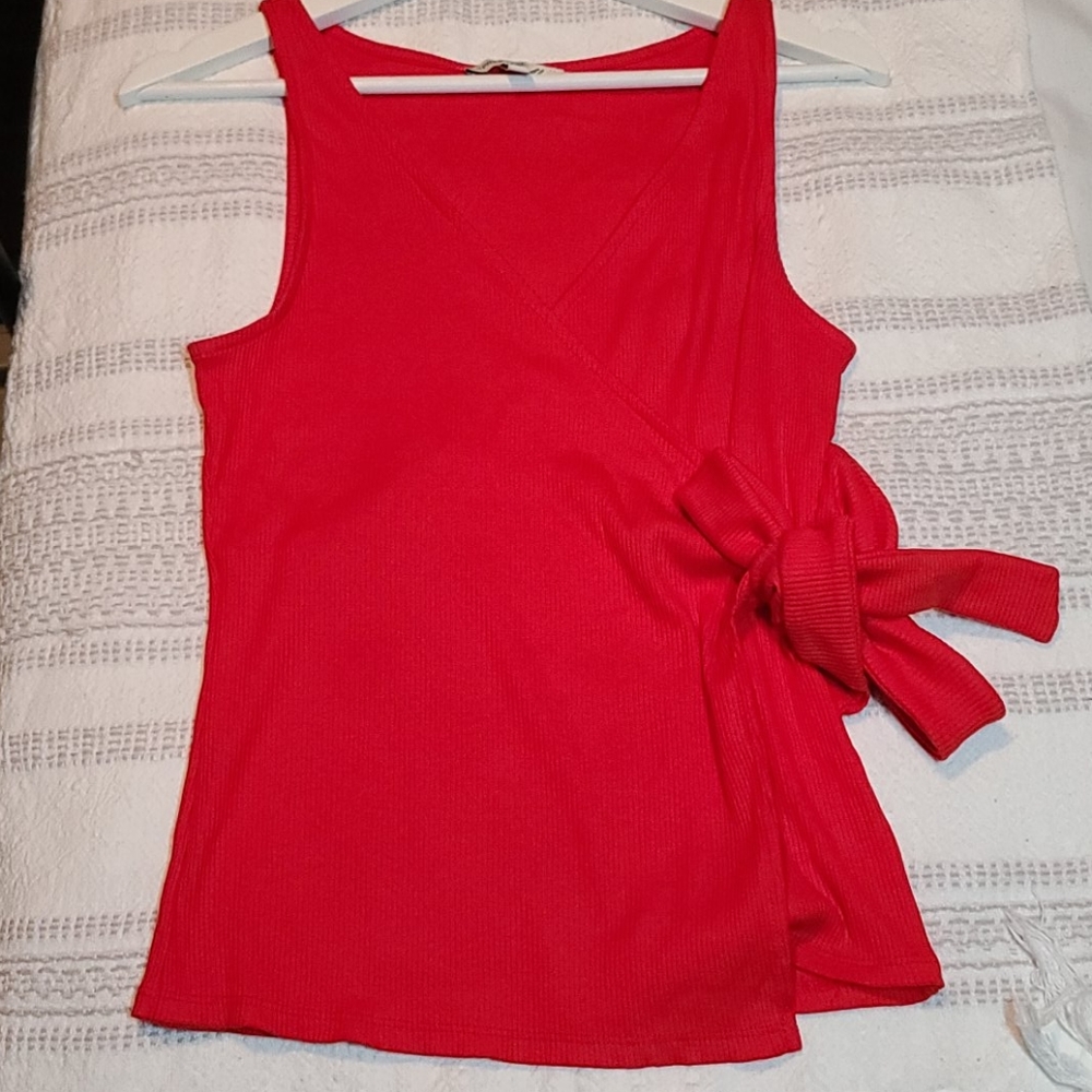EXPRESS, Top